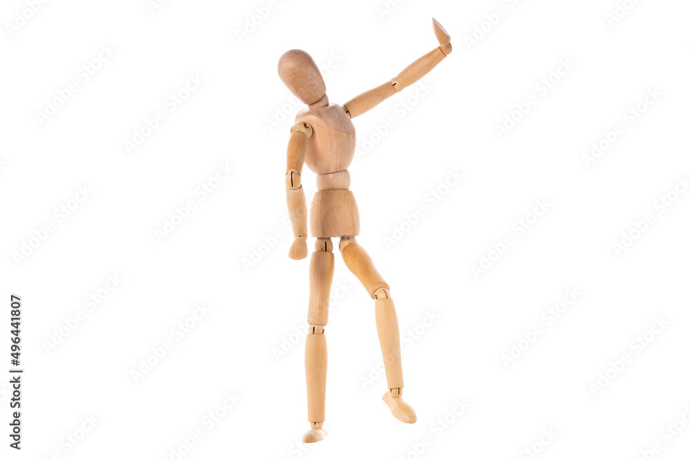 a wooden man stands with his hands up to the top isolated on a white background a wooden man stands with his hands up to the top isolated on a white background