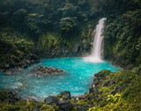 Waterfall and natural pool with turquoise water Rio Celeste, Costa Rica