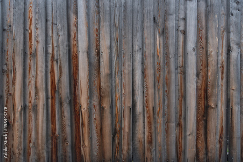 larch boards mounted overlapping vertically wooden background