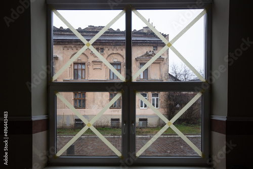 Taped windows in Lviv during russian war
