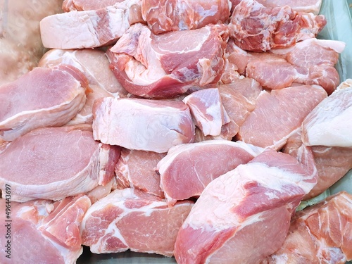 Top view of pork as a background in the market for sale at Thailand, fresh meat for cooking
