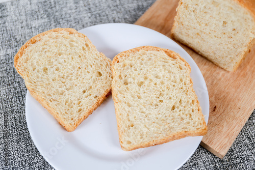 Wheat bread loaf on a white background. 