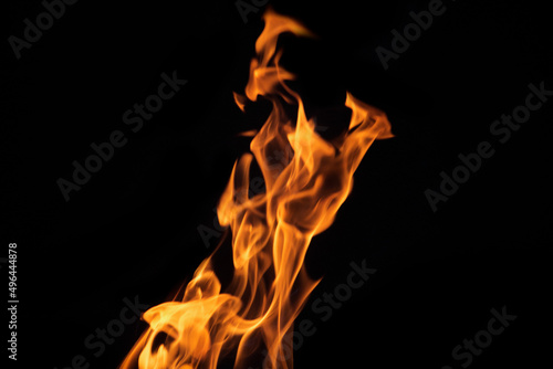 Close up burning flames on black background for graphic design or wallpaper