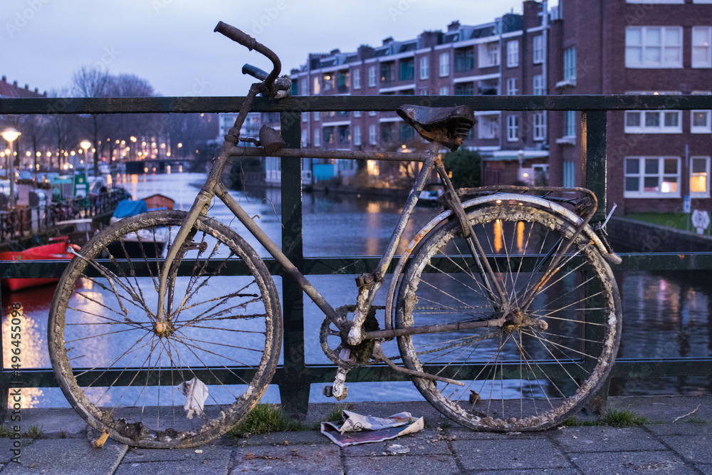 Fototapeta premium Old bike over the river selective focus