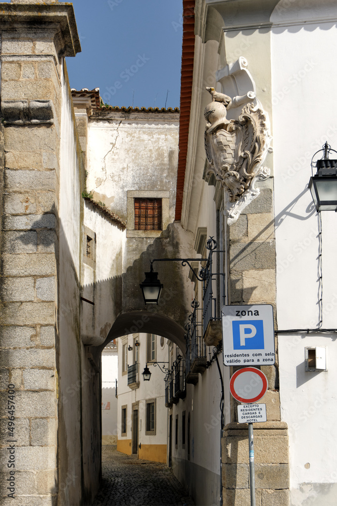 granite coat of arms of a knight on the wall of an old mansion in Evora, Alentejo, Portugal granite coat of arms of a knight on the wall of an old mansion in Evora, Alentejo, Portugal
