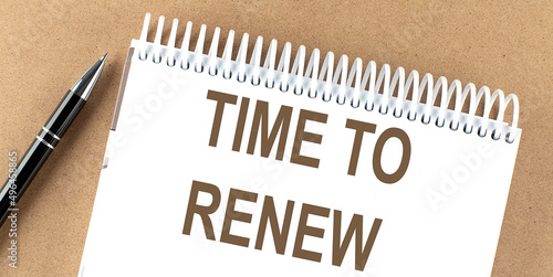Billede på lærred TIME TO RENEW text on a notepad with pen, business