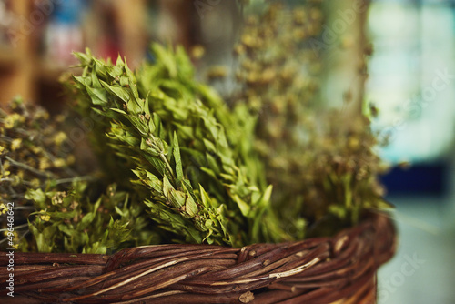 Let food be thy medicine. Shot of herbs in a store. photo