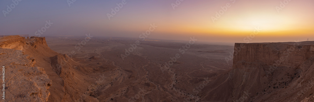 Sunset panoramic view of the Edge of the World escarpment tourist area near Riyadh, Saudi Arabia