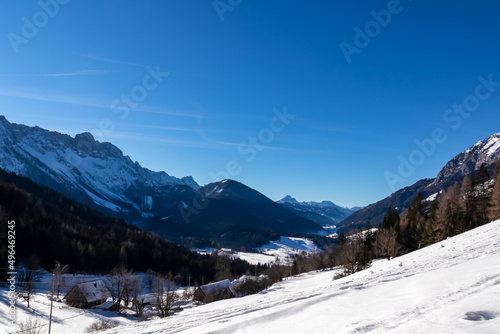 Panoramic view on snow capped mountain peaks of Karawanks in Carinthia, Austria. Julian Alps. Winter wonderland in the Austrian Alps, Europe. Ski touring. Hochobir. Mountain village Zell Sele © Chris