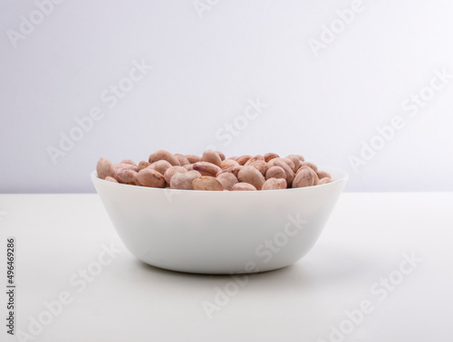 A bowl of kidney beans isolated photo