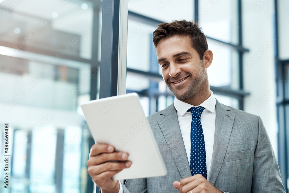 Stay motivated and be creative. Shot of a professional businessman using a digital tablet in his office. Stay motivated and be creative. Shot of a professional businessman using a digital tablet in his office.