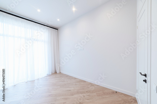 New Empty large room with dark floor and white walls