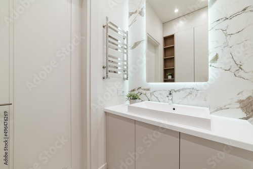 stylish and modern bathroom interior with a large mirror