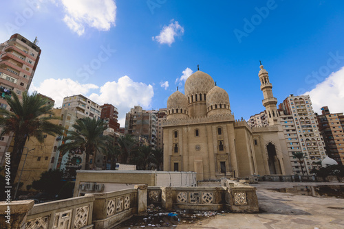 Exterior View to the Very Beautiful Example of Islamic Art - ​Egyptian Abu al-Abbas al-Mursi Mosque with the Garbage and Trash in the background in Alexandria