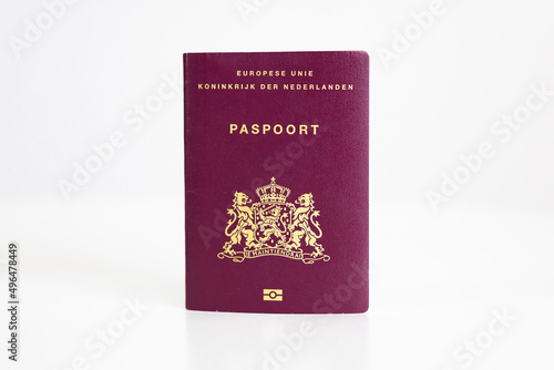 Dutch passport from the Netherlands isolated on a plain white background 