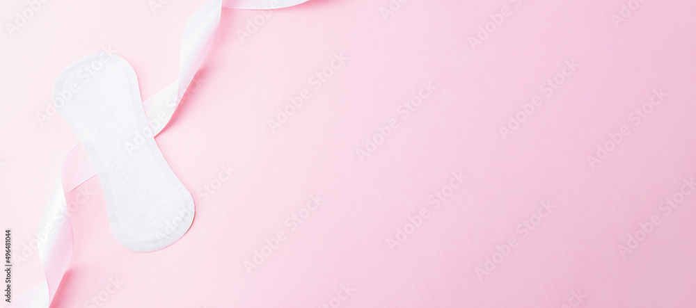 Feminine hygiene menstrual pads. Menstruation napkin for woman hygiene on pink background. Menstruation feminine period. Menstruation, critical days, zero waste, eco, ecology banner.