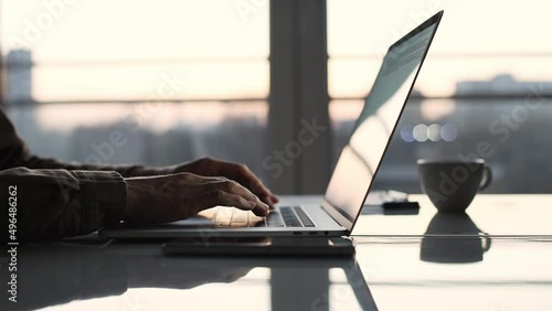 Man hands typing on computer keyboard closeup, businessman or student using laptop at home, online learning, internet marketing, working from home, office workplace, freelance concept
