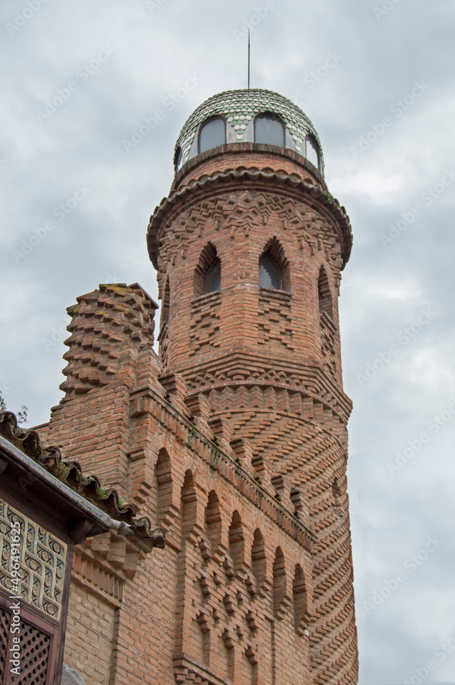 brick tower in neomudejar style in the mansion of Laredo in Alcalá de Henares. Spain
