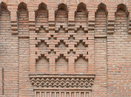 brick ornament in neomudejar style on a facade photo
