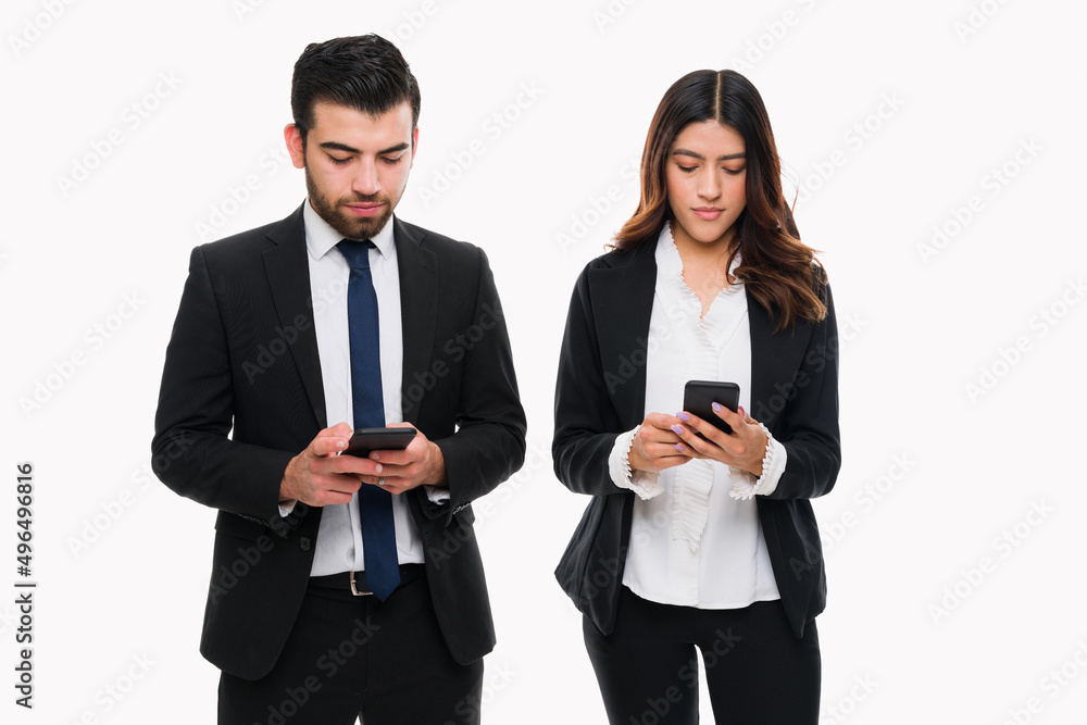 Business partners using their smartphone Business partners using their smartphone