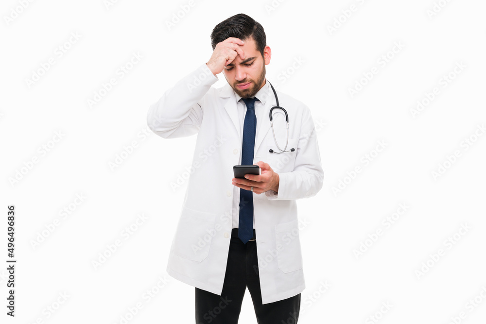Tired physician receiving bad news