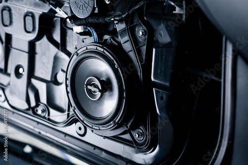 Wallpaper Mural Technician installing the car speaker Torontodigital.ca