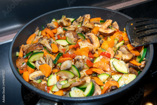 Vegetable pan with fresh mushrooms and vegetables