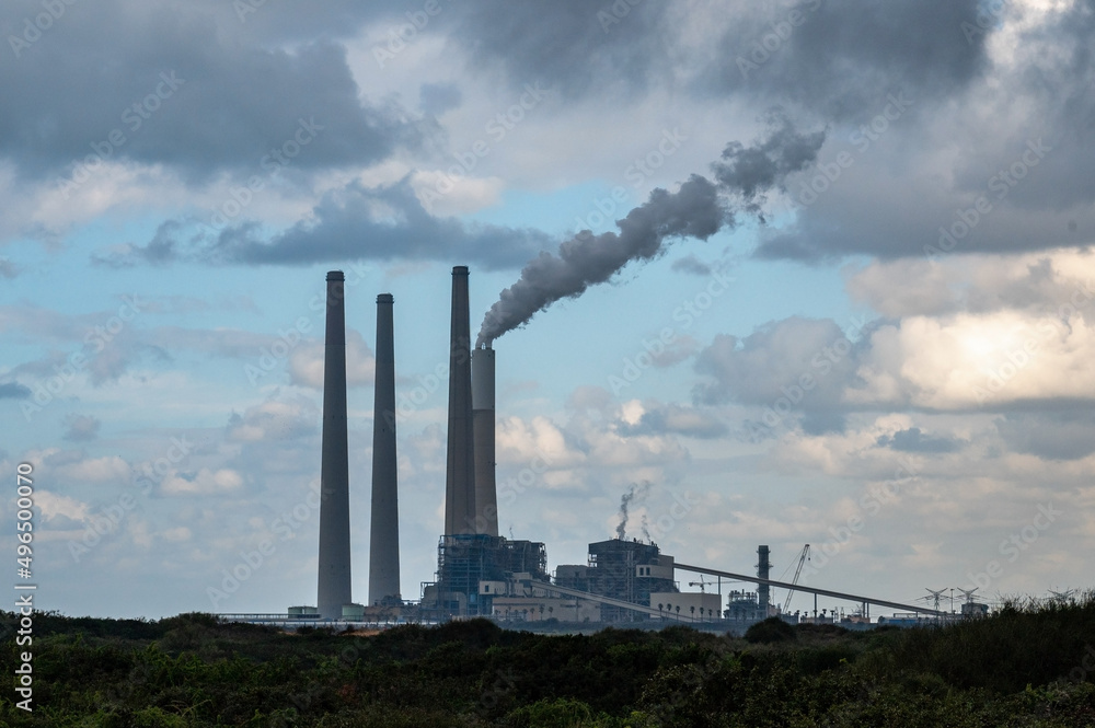 Air pollution from power plant chimneys. Power plant in Hadera on the Mediterranean coast. Israel.