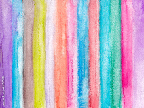 Multicolored watercolor vertical stripes on paper.