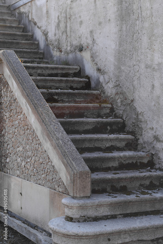 beautiful old stone staircase in italian castle in europe