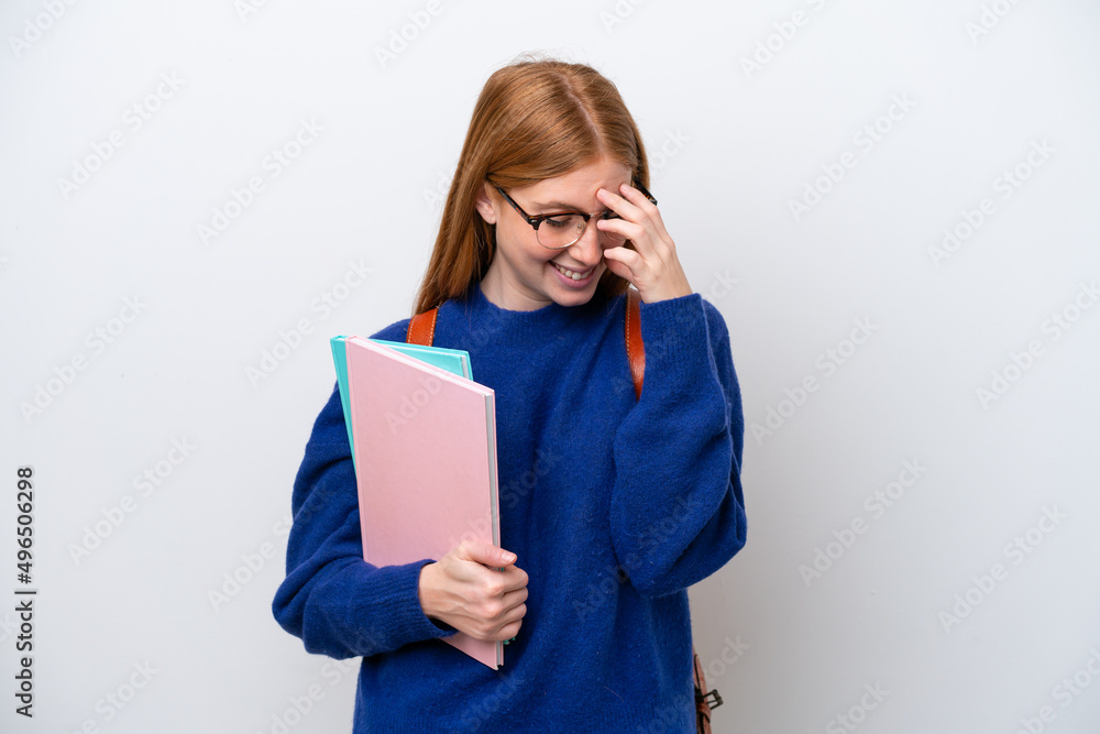 Young student redhead woman isolated on white background laughing Young student redhead woman isolated on white background laughing