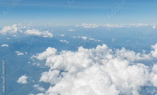 Top view cloudy mountains from a plane © xy