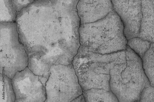 Old gray cracked surface retro crack concrete broken wall grey cement damaged background