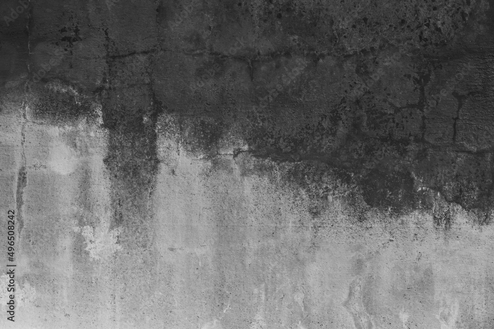 Black paint on the old abstract design surface of the concrete cement gray wall texture grunge background