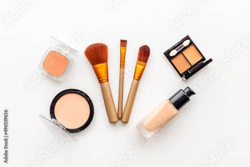 Makeup cosmetic products set with eyeshadow and brushes. Beauty flat lay