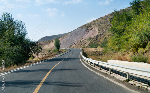 Curved asphalt road in mountains of Inner Mongolia, China