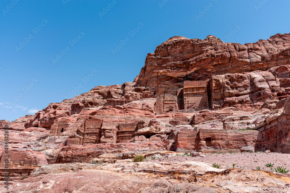 Cave-houses of Bedouin nomads in the ancient city of Petra in Jordan. Cave-houses of Bedouin nomads in the ancient city of Petra in Jordan.
