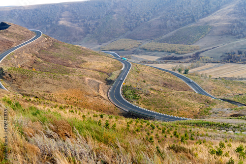Winding road in mountain valley