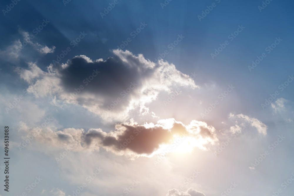 Blue sky with clouds and sunlight