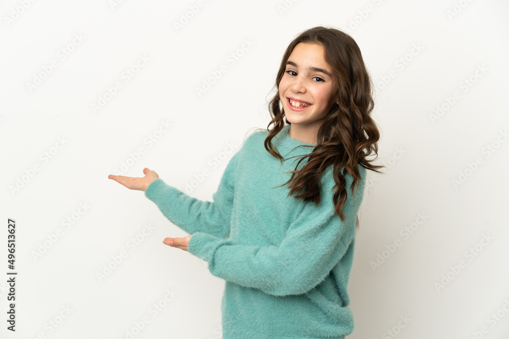 Little caucasian girl isolated on white background extending hands to the side for inviting to come Little caucasian girl isolated on white background extending hands to the side for inviting to come