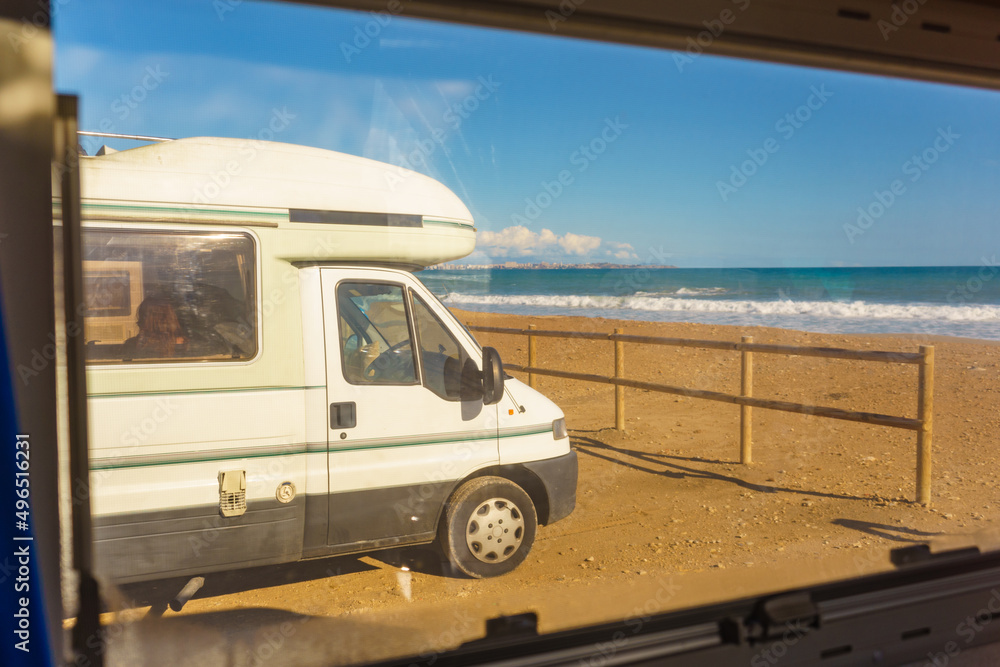 View from caravan inside on camper on beach