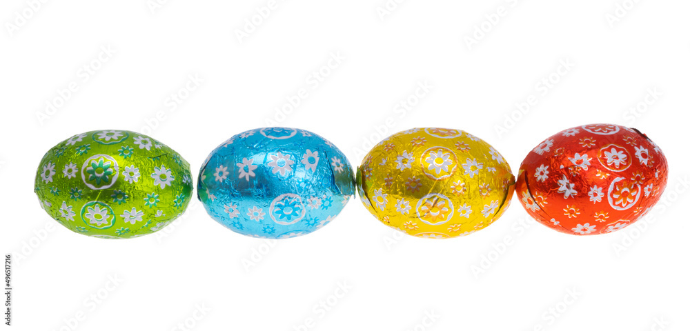 Fototapeta premium chocolate eggs in foil isolated