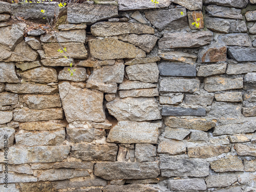 Backgrounds of the old fortress wall. Background of vintage stone wall