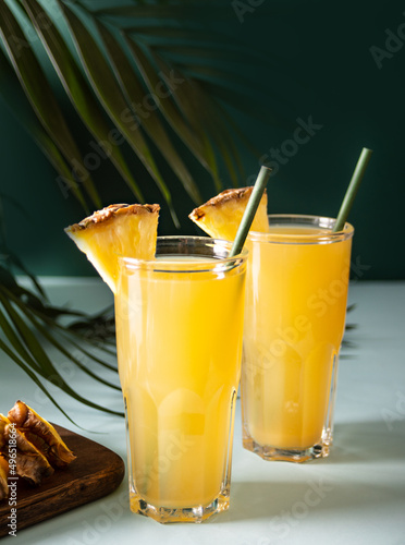 Summer refreshing tropical drink juice or cocktail with pineapple juice and tequila.