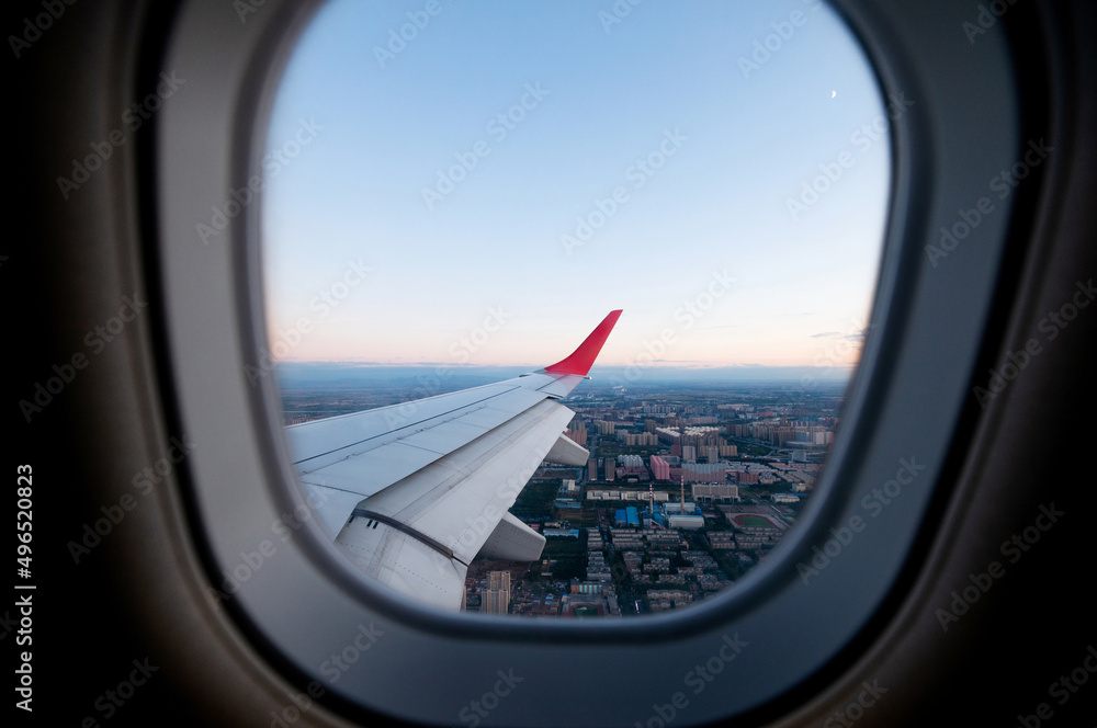 Looking at the town through the airplane window Looking at the town through the airplane window
