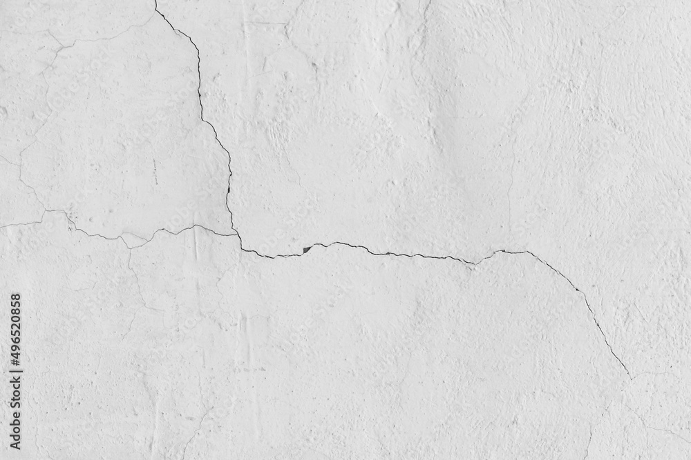 Fototapeta premium Old cracked surface white crack concrete broken wall cement damaged background