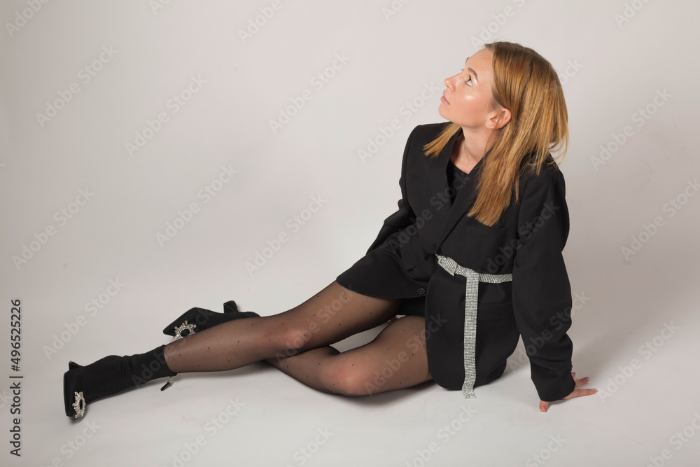 Young blonde model appearance posing in the studio Young blonde model appearance posing in the studio