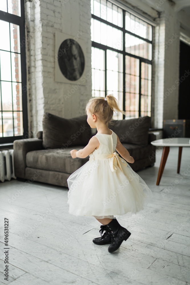 little girl dancing on holiday