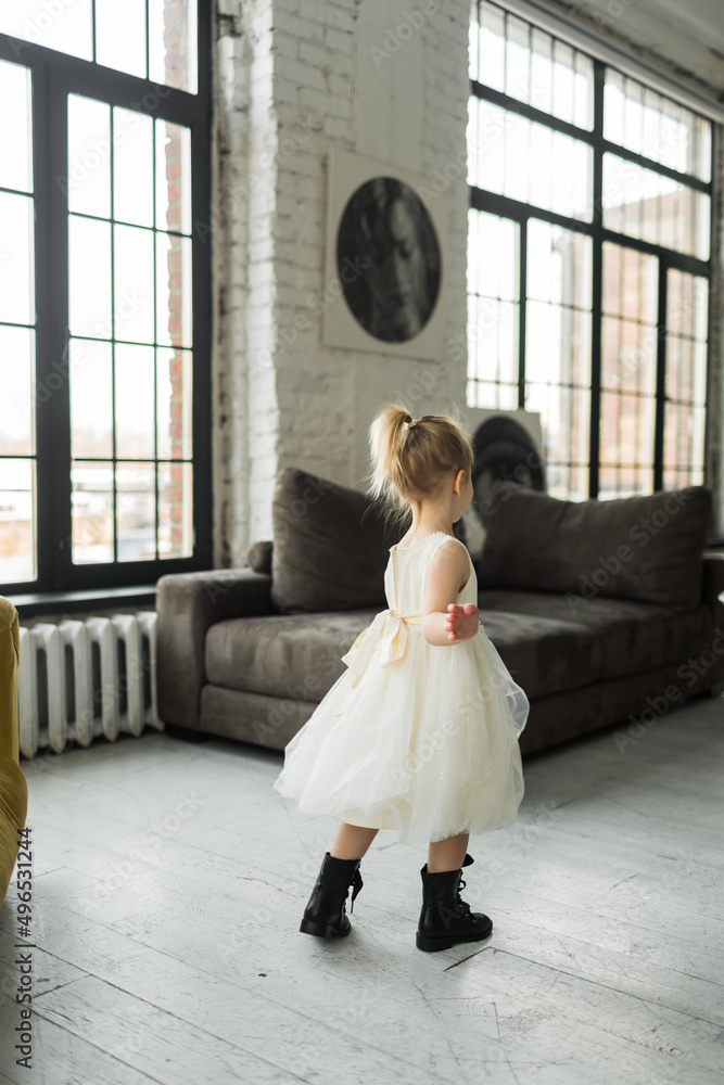 little girl dancing on holiday