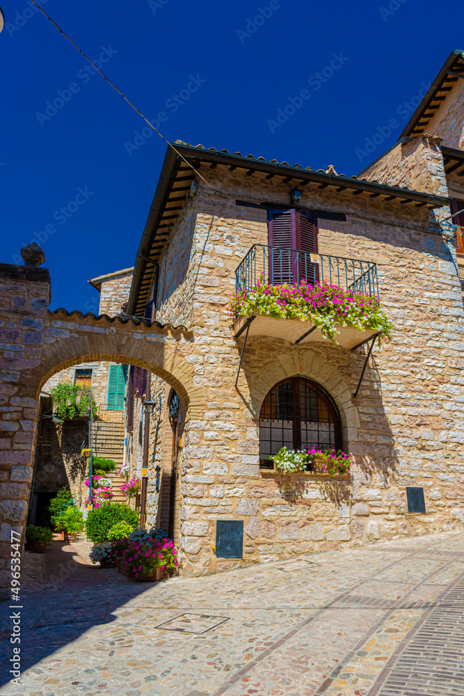 Naklejka premium Medieval street in the historic center of Spello, town in Umbria Italy